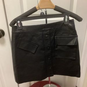 BHL black leather skort SZM, zips in back, has silk shorts inside. NWT,see pics